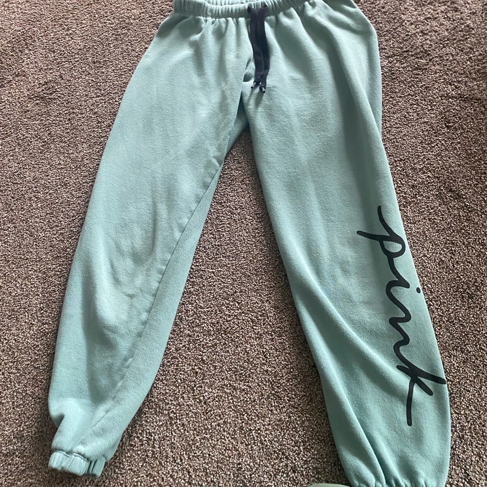 Pink classic sweatpants in a dusty green color
